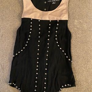 Size medium. Partially open back